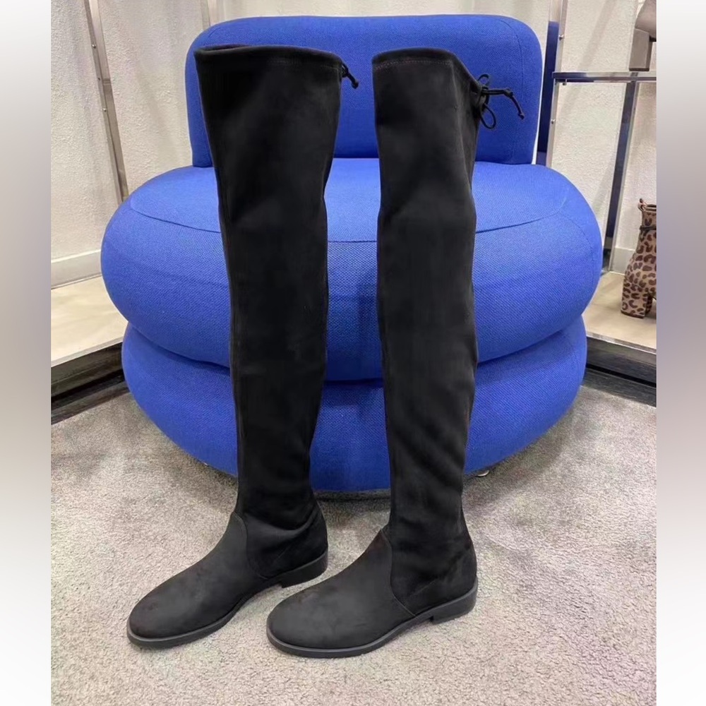 Women's Boot 
Designer Stuart Weitzman
Jocey City Boots